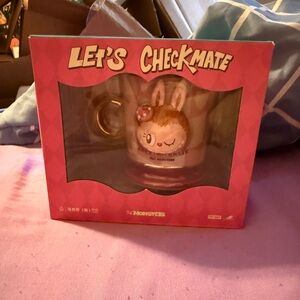 The Monsters Let’s Checkmate Pink mug